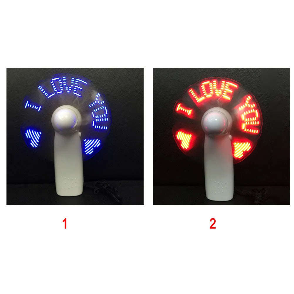 White handheld fan with LED love pattern display showing blue and red lights, measuring 10.8cm tall