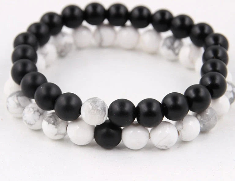 Handcrafted black lava beaded bracelet with seven chakra stones for healing and balance