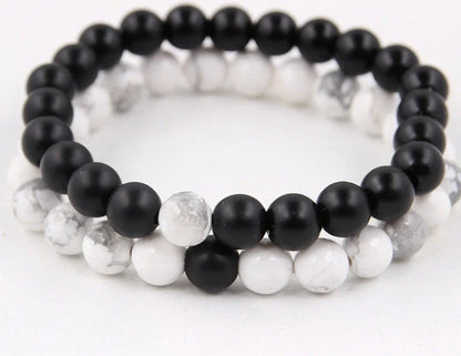 Handcrafted black lava beaded bracelet with seven chakra stones for healing and balance