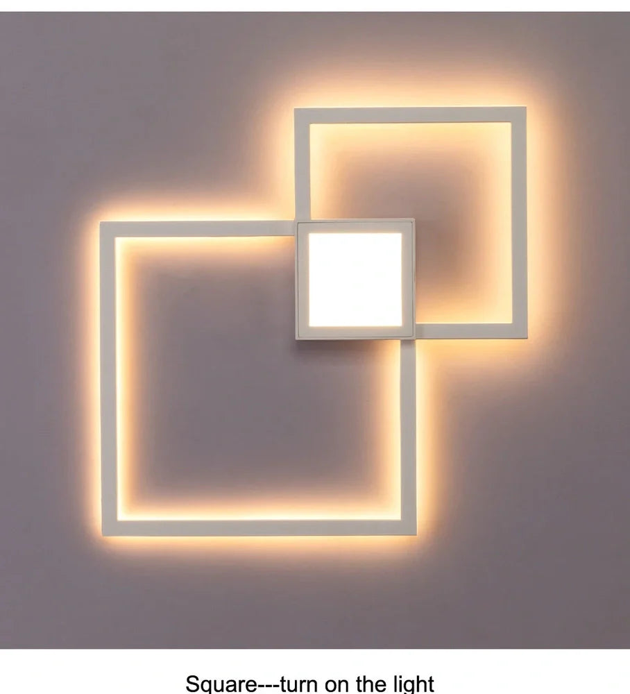 Square 35.3cm geometric LED wall light in white, iron frame with acrylic diffuser, 20W-24W output