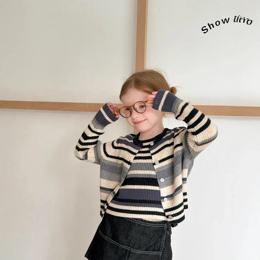 Grey striped knitted vest and jacket two-piece set with long sleeves on mannequin