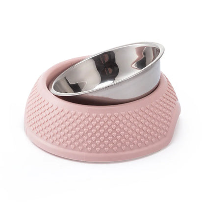 Blue stainless steel pet bowl with non-slip weighted base on a plain surface.