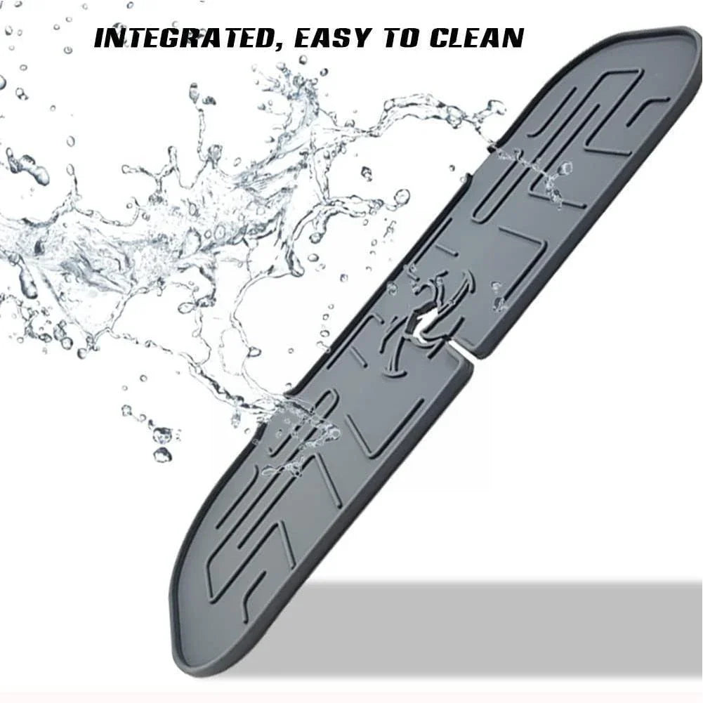 Durable silicone faucet splash guard that catches water splashes and keeps kitchen countertops clean and dry