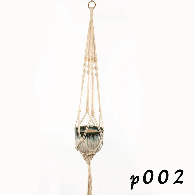 Woven wire lattice plant holder with natural cotton rope, shown in a rustic style supporting a green plant.