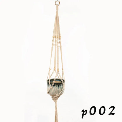 Woven wire lattice plant holder with natural cotton rope, shown in a rustic style supporting a green plant.