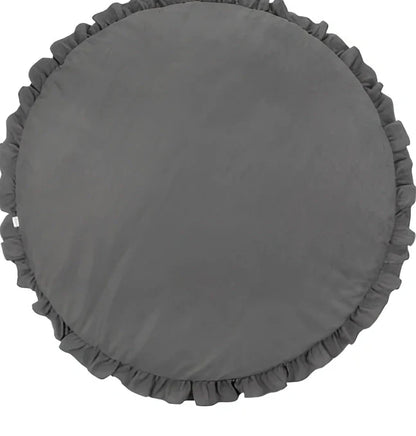 Circular baby play mat with lace border showing 2cm thickness measurement