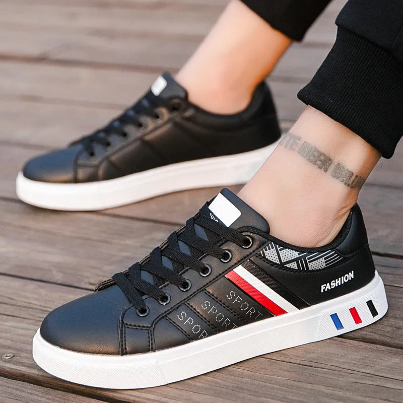 Sports shoes in black, grey, or white colours with European sizing 39-44 and foot length measurements 245-270mm
