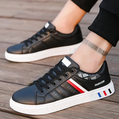 Sports shoes in black, grey, or white colours with European sizing 39-44 and foot length measurements 245-270mm