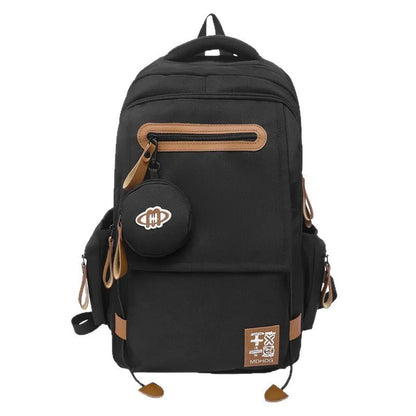 Large waterproof nylon travel backpack in blue with contrast stitching and 20-35 litre capacity
