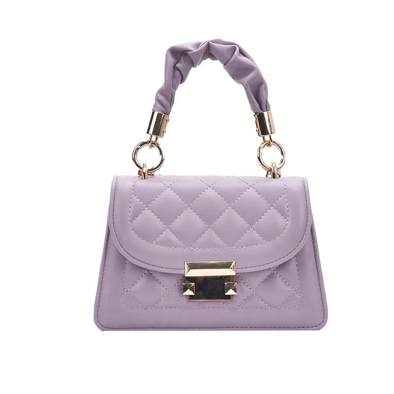 Beige rhombus-shaped women's crossbody bag with a long strap, showing front view and size.