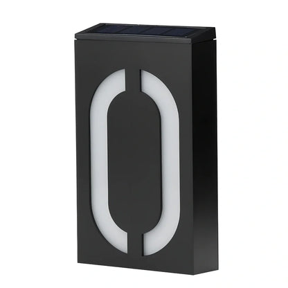 Solar powered house number with LED illumination showing waterproof construction and concealed mounting