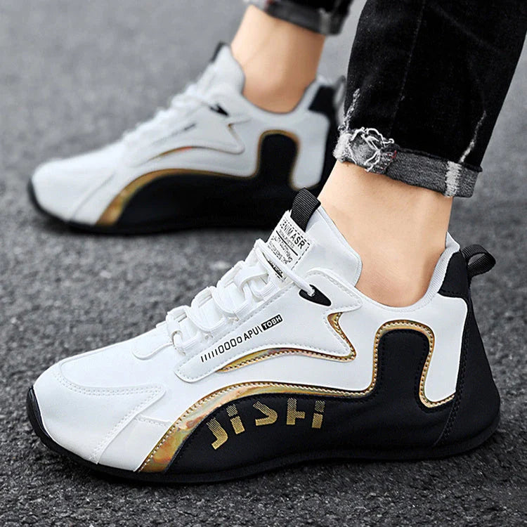 Stylish lace-up sneakers for men in colorblock design, with breathable mesh lining and lightweight, non-slip sole