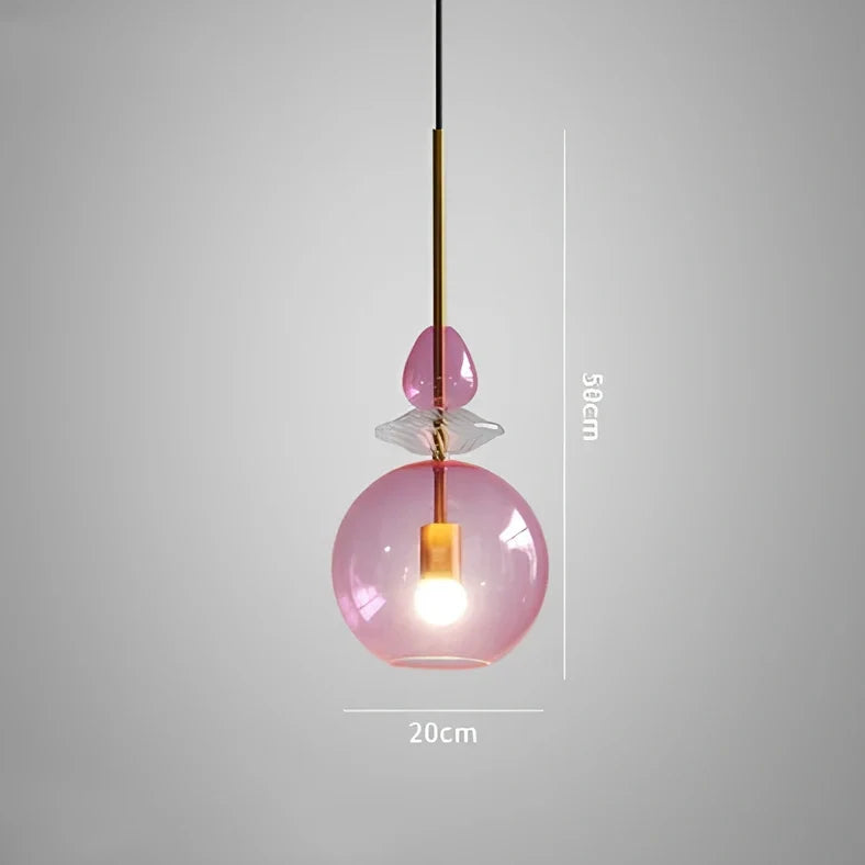 Glass chandelier with adjustable height above bar counter showing macaron-inspired candy glass design