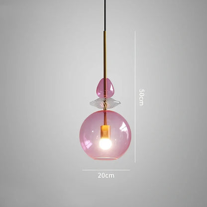 Glass chandelier with adjustable height above bar counter showing macaron-inspired candy glass design