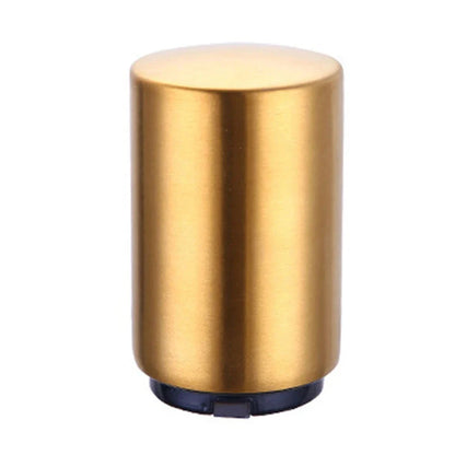 Stainless steel automatic press bottle opener with titanium-plated finish showing press mechanism and textured handle