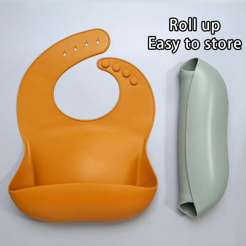 Soft waterproof silicone baby bib with food catcher in various colors