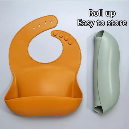 Soft waterproof silicone baby bib with food catcher in various colors