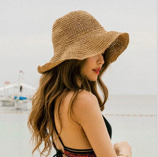 Foldable straw sun hat for women with wide brim for UV protection