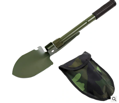 Military folding shovel extended to 40cm with pick end and saw blade visible