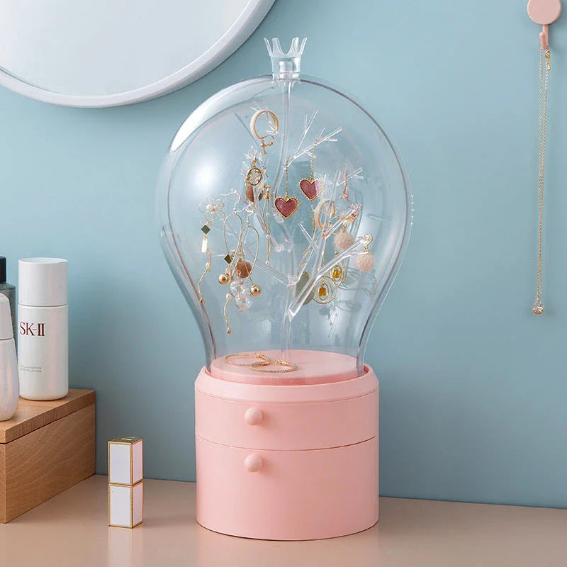 Rotating jewelry organizer with LED lights and USB charging for necklaces, earrings, and makeup storage