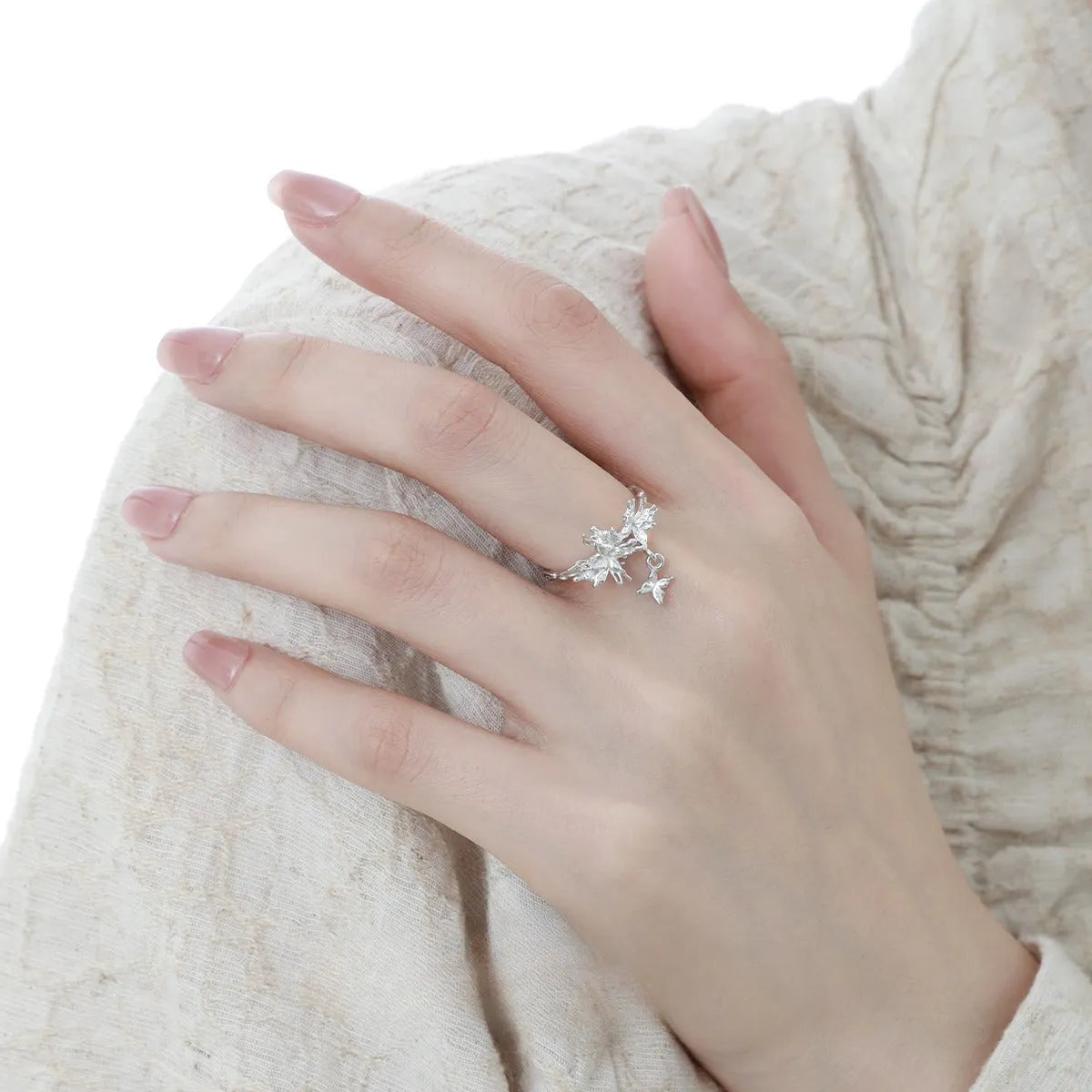 Original design wild butterfly silver ring with adjustable opening, shown in white gold and 18K gold colour options.