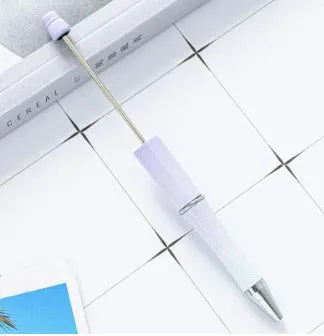Rotating bead ballpoint pen in gradient colour with ABS plastic and steel wire construction