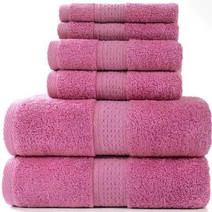 Cotton towel set showing bath towel, hand towel, and face cloth in coordinated sizes