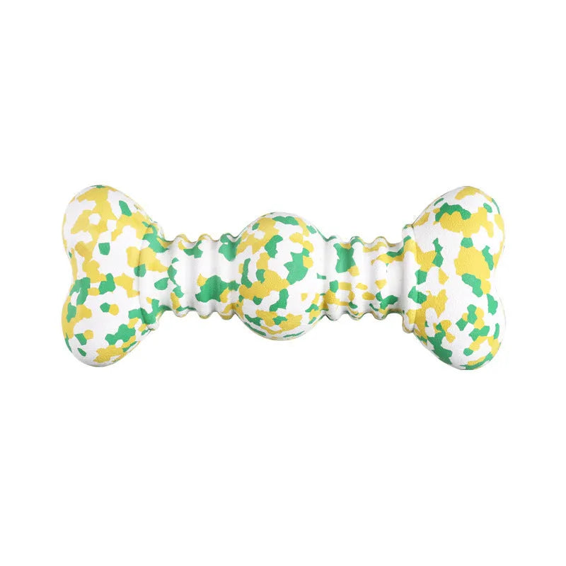 Natural rubber dog chew toy with camouflage design for aggressive chewers, USDA organic certified, in green, white, and yellow colours.