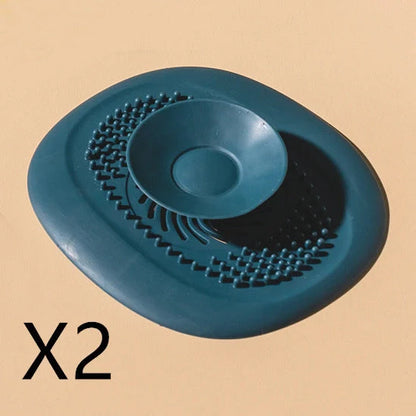 TPR vortex design sink drain cover in twilight orange, quiet blue, mango yellow, and gentian green