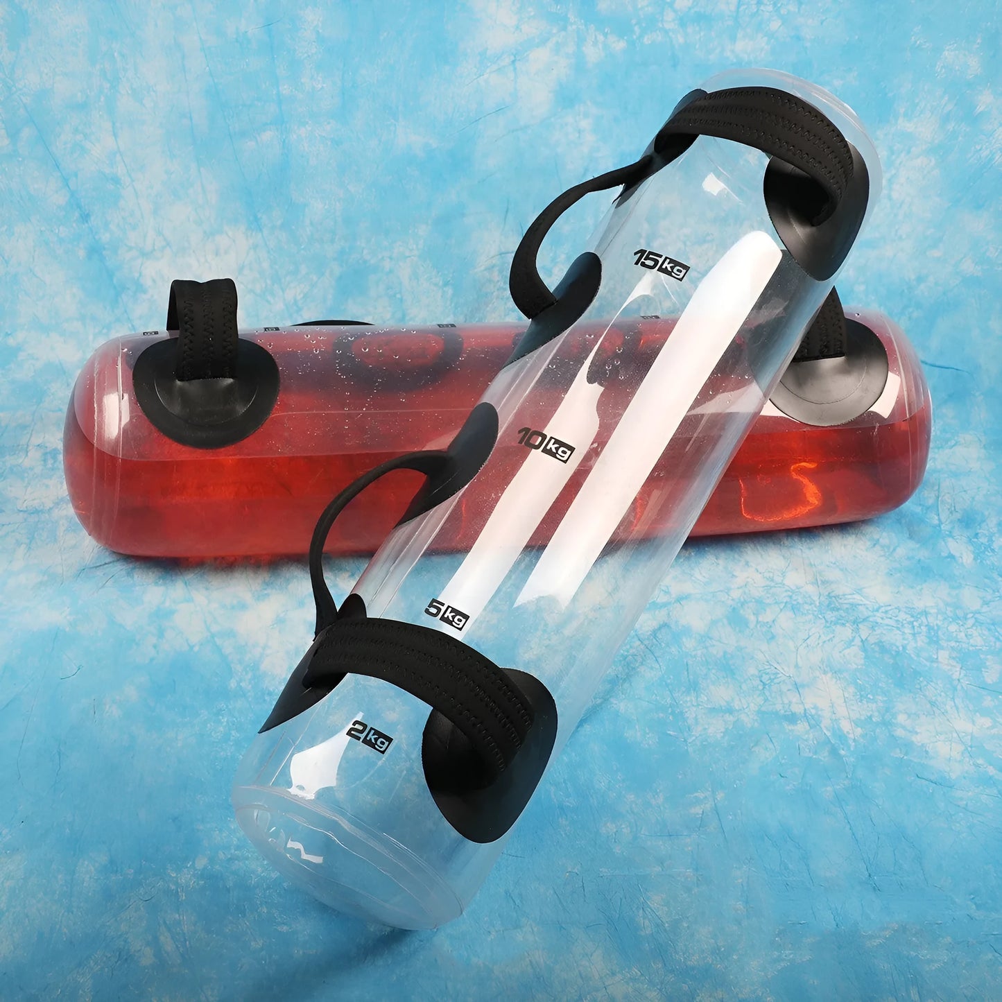 Transparent PVC inflatable water bag dumbbell for adjustable weight training.