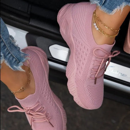 Women's solid colour sneakers with a thick sole, shown in multiple colour options.