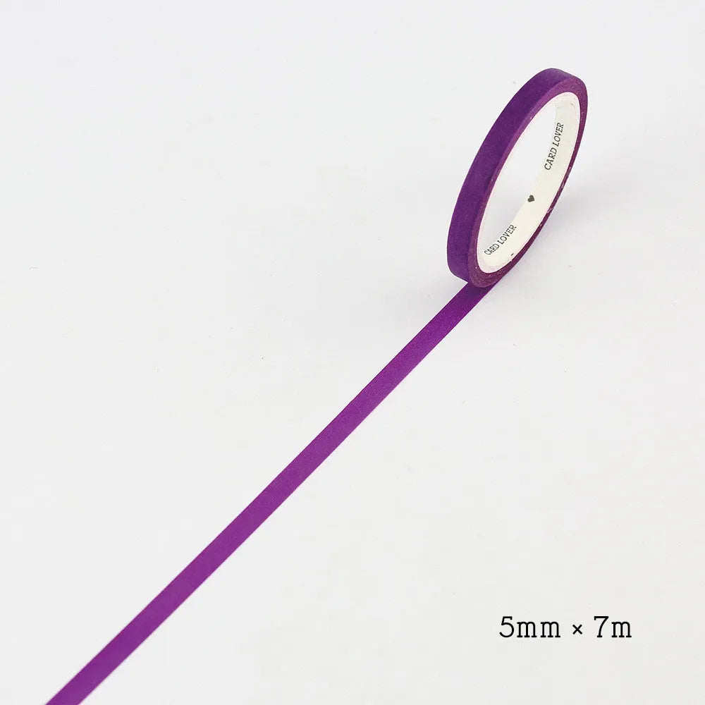 Two rolls of solid colour paper tape, one crimson and one deep purple, each 5mm wide.