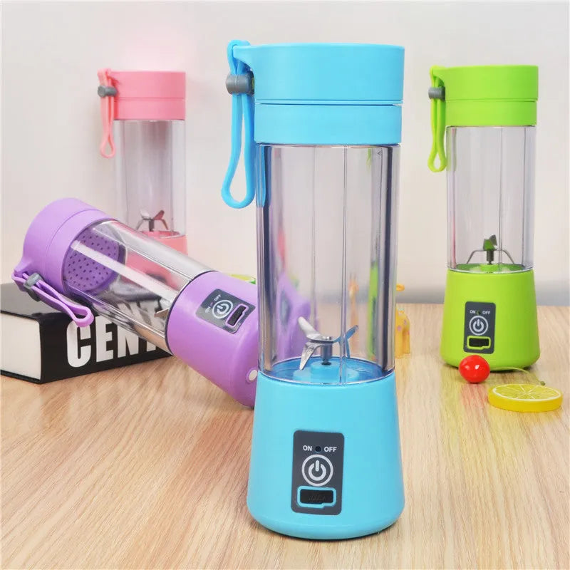 Pink portable USB electric fruit juicer blender cup with stainless steel blade and carry handle.
