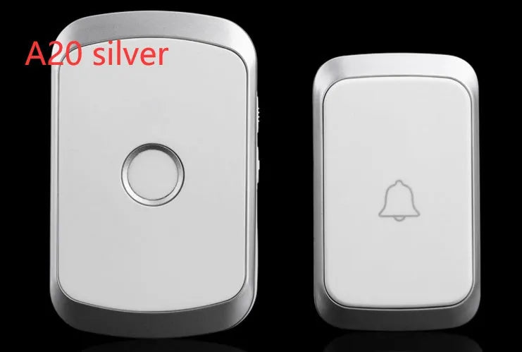 White wireless doorbell kit with plug-in chime and battery-powered button on a wooden door