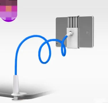 Bedside oversize flat panel handset with long arm holding a mobile phone on a table