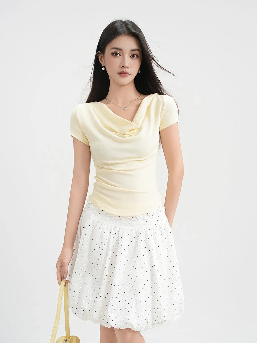Women's one-shoulder draped neckline short sleeve top in slim fit with pleat detail, shown in Apricot