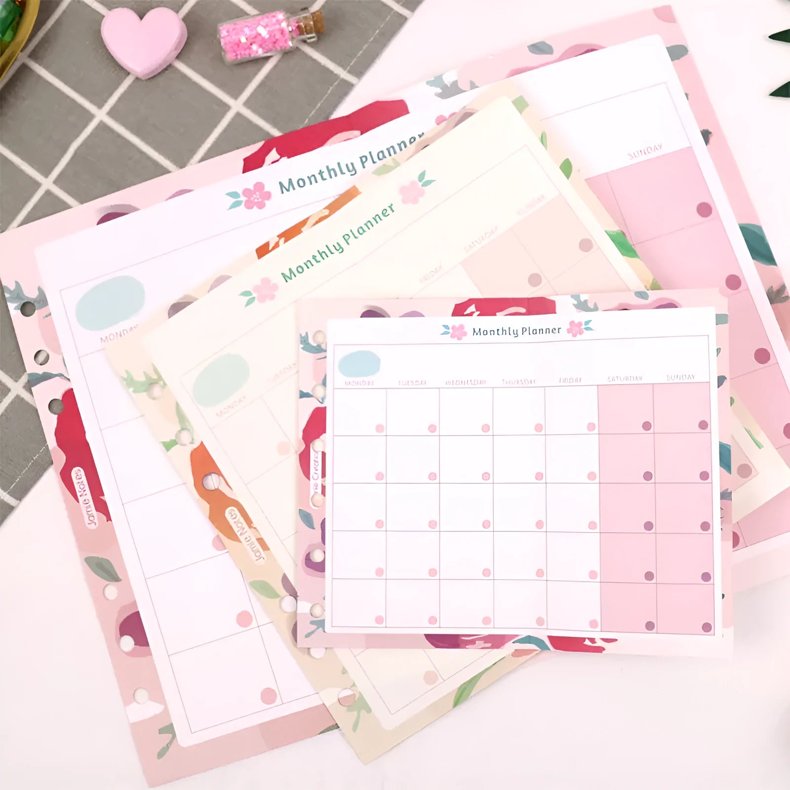 Four options of handbook loose-leaf refills showing floral and symphony designs in A5, A6, and A7 sizes