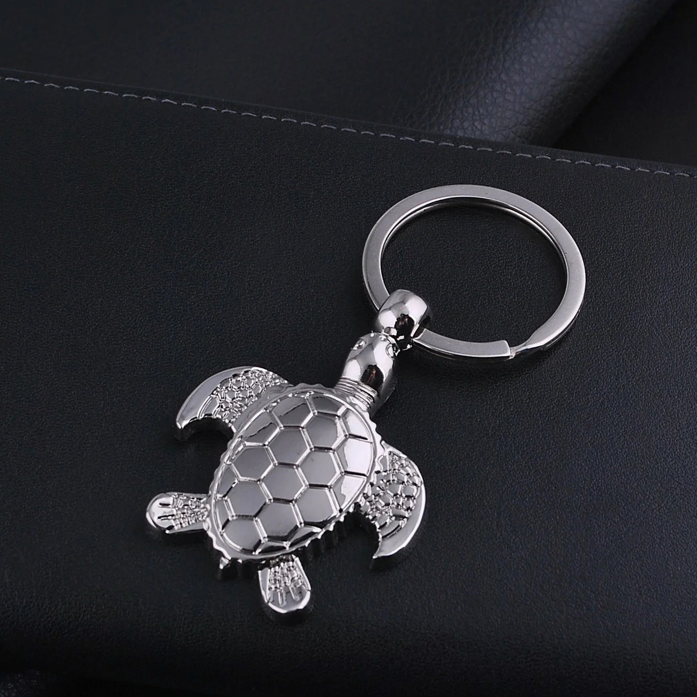 Silver zinc alloy animal shape pendant keychain on a keyring