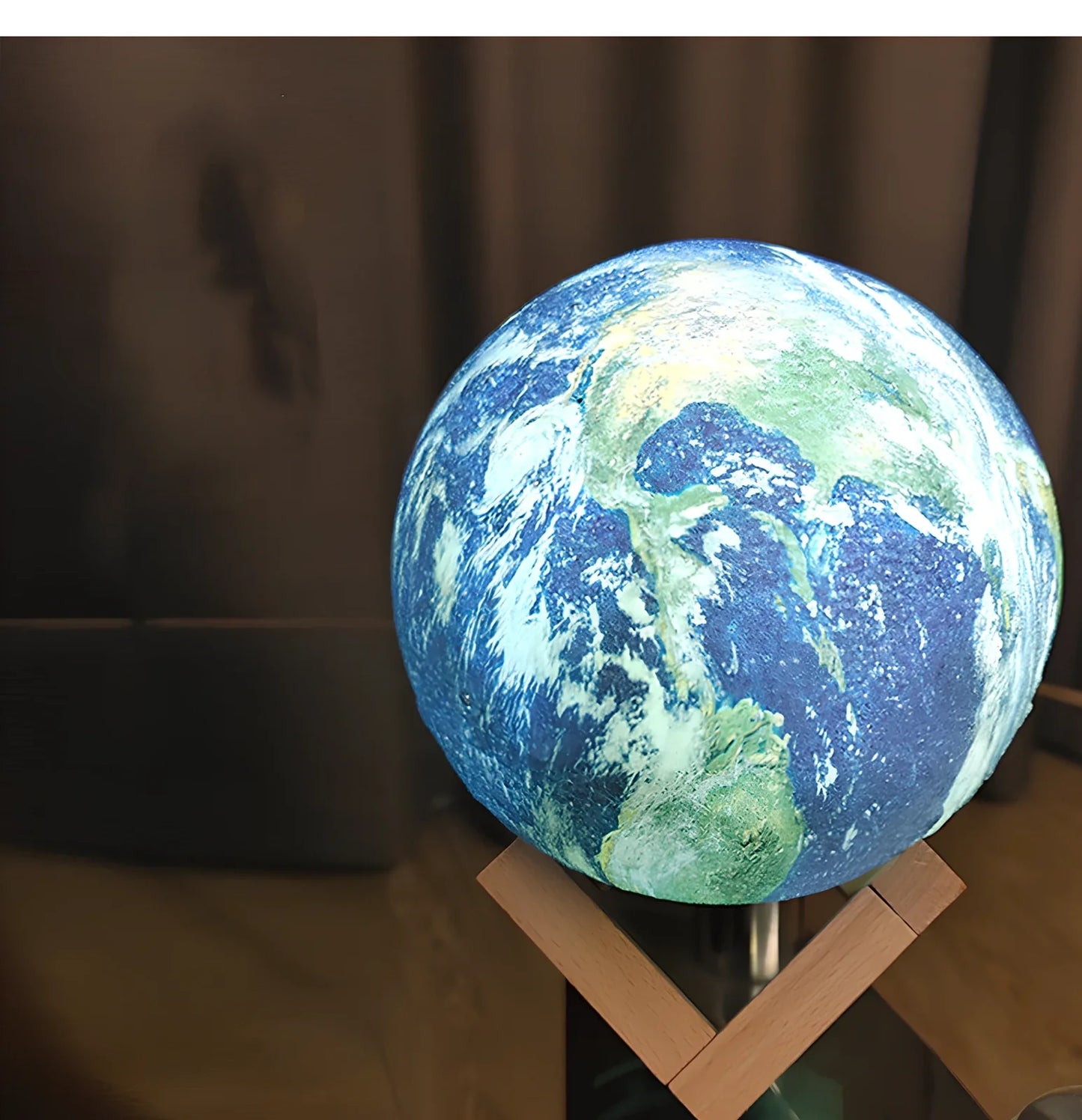 3D printed Earth lamp showing mountain topography with LED illumination through PVC material