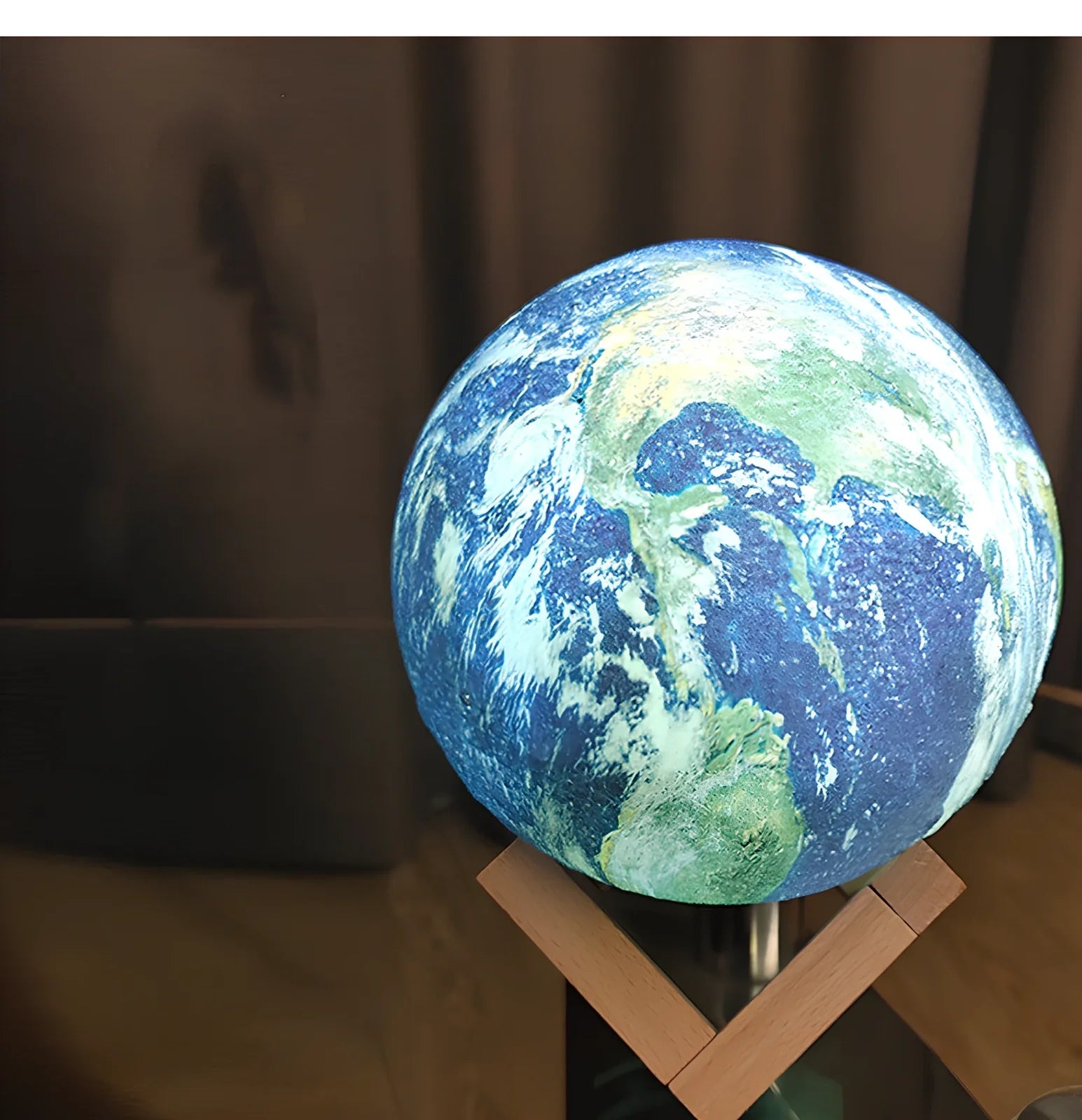 3D printed Earth lamp showing mountain topography with LED illumination through PVC material