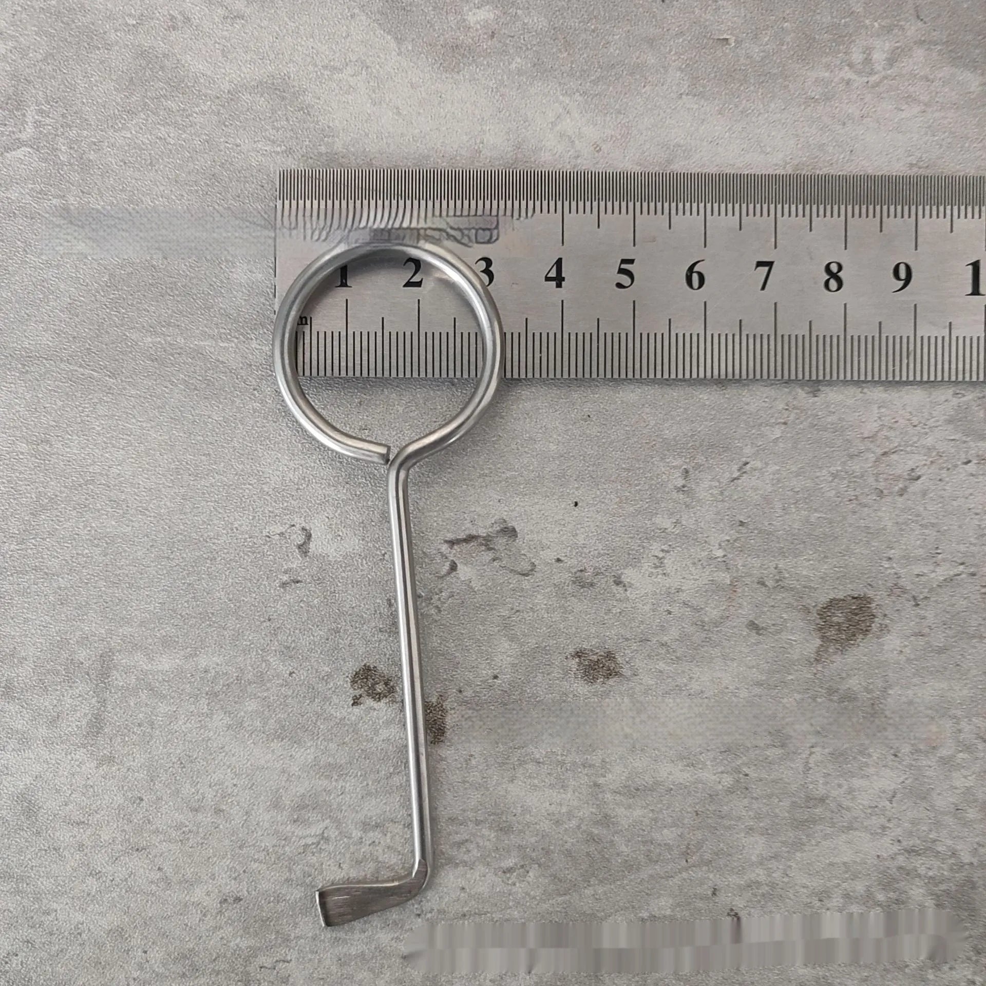 Two silver alloy wrench tools from a portable universal family set on a plain background.
