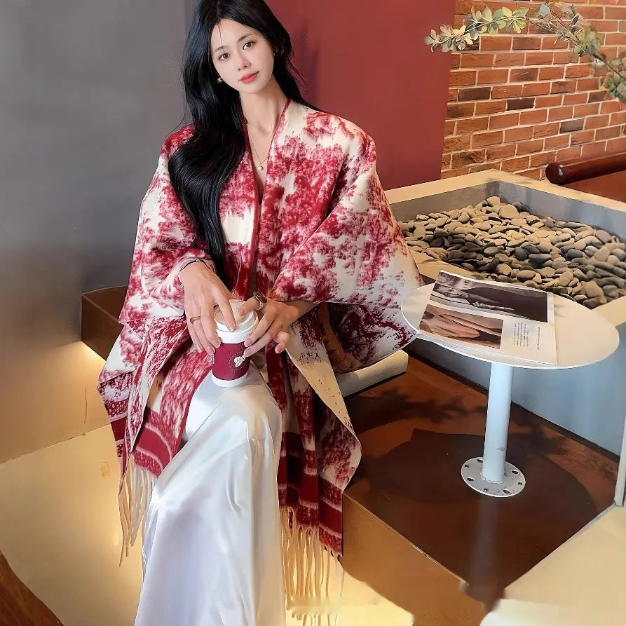 Women's polyester tassel scarf cape in free-size design showing 15 cm fringe detailing and shawl-style drape