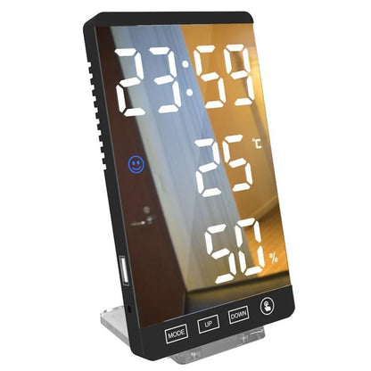 Multifunctional LED mirror alarm clock displaying time, temperature, and humidity