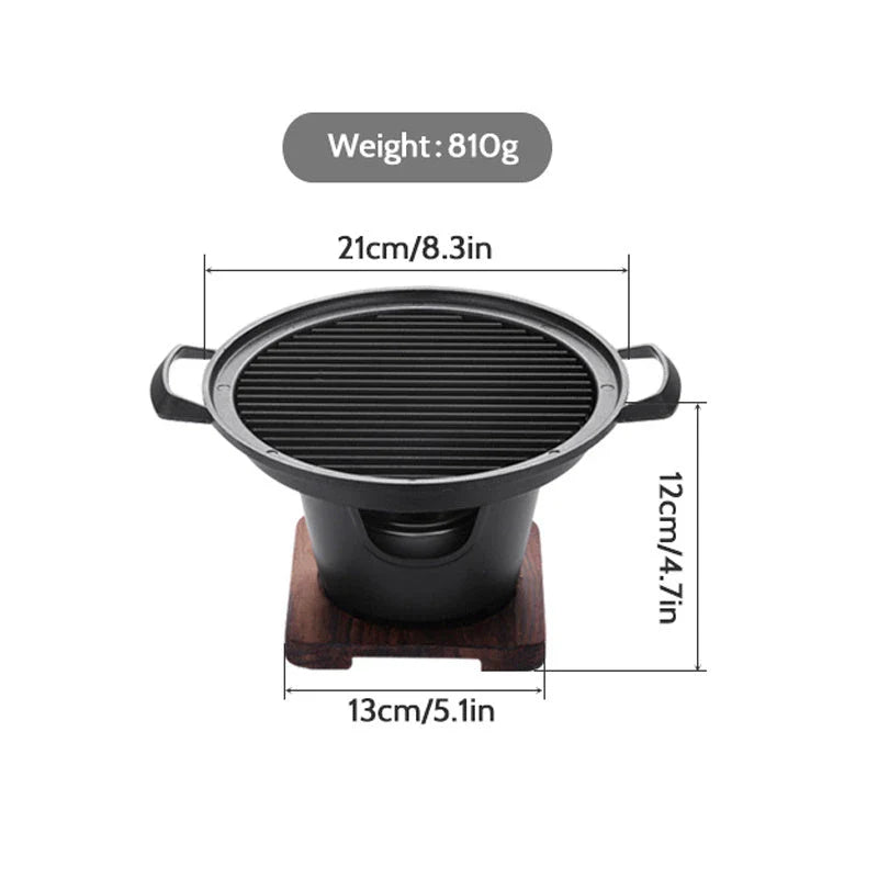Compact tabletop barbecue grill with dual alcohol burners, made of durable aluminum with a nonstick cooking surface