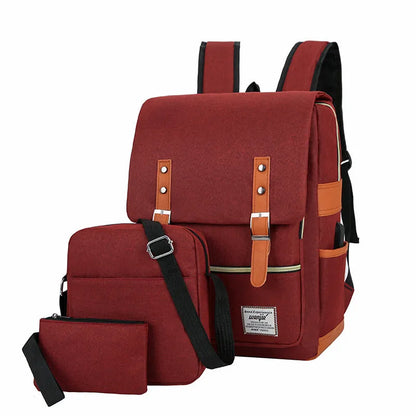 Three-piece waterproof Oxford cloth business backpack in wine red with curved shoulder straps.