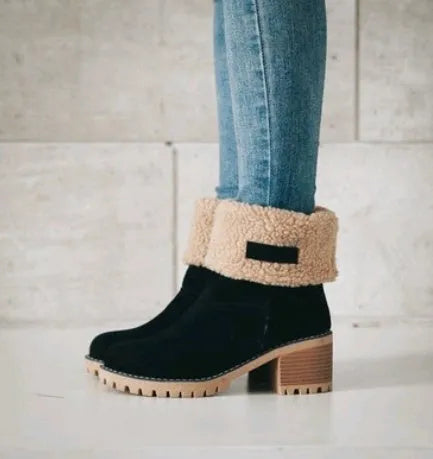 Mid-tube thick heel suede snow boots in black with beef tendon sole and waterproof platform.
