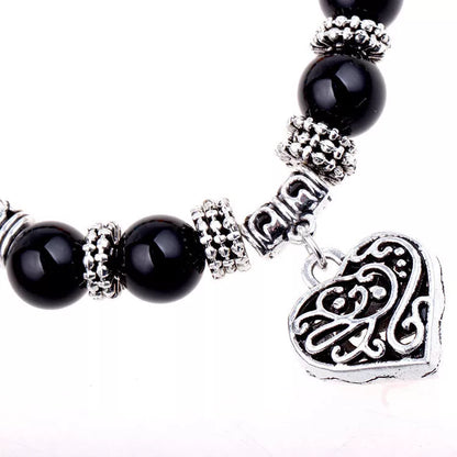 Seven Chakra Yoga Energy Bracelet with adjustable length and symbolic design for energy balance