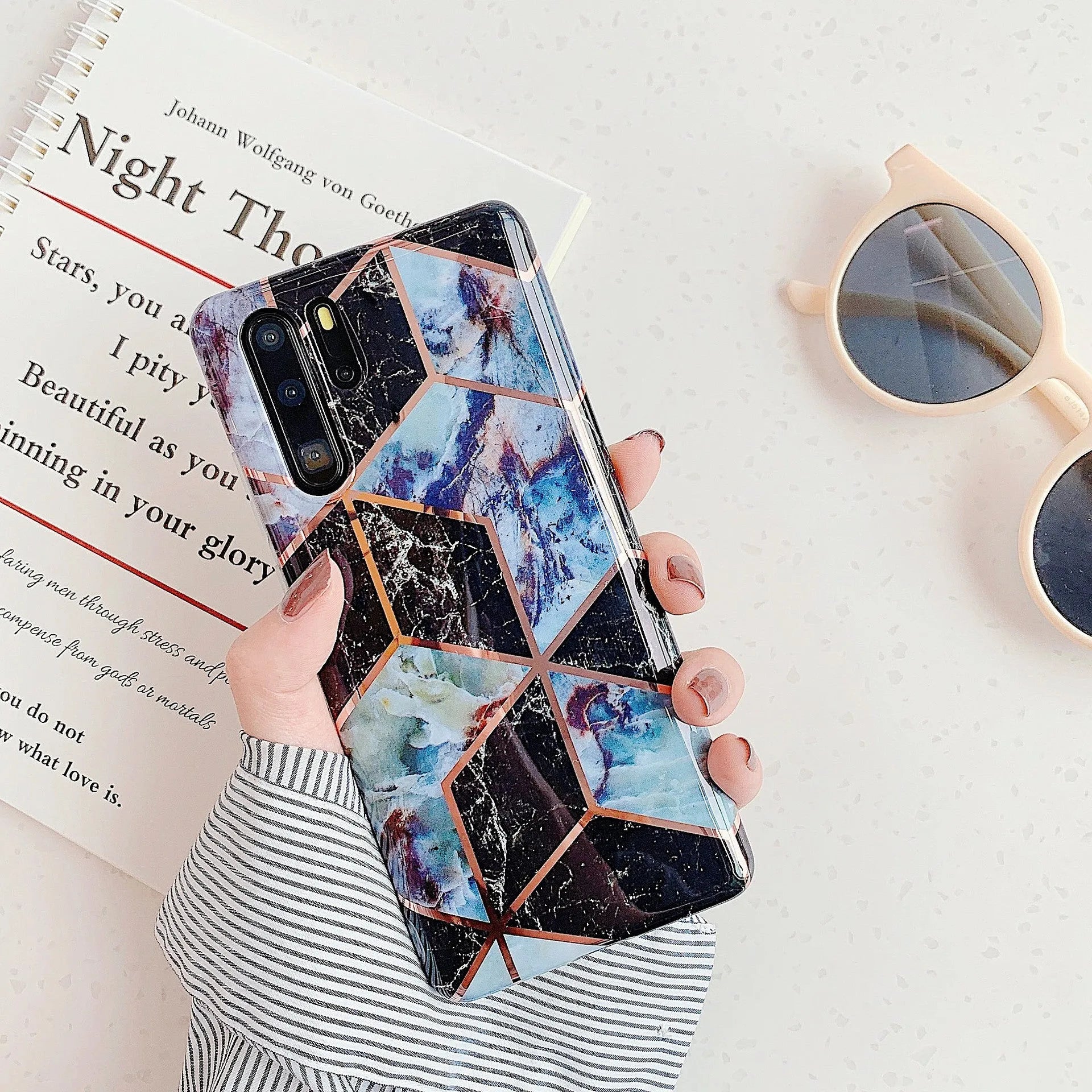 Electroplated marble mobile phone case in various colours for Huawei and Samsung models, showing slim TPU back cover design
