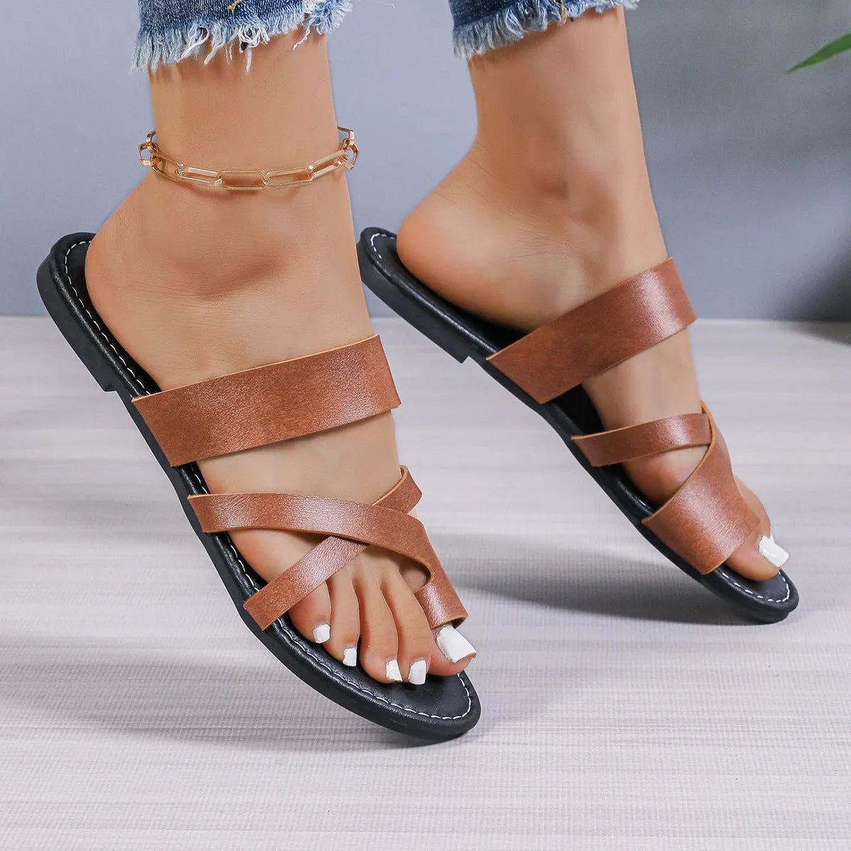 Casual round-toe beach slippers with hollow-out design in black, brown, or wine red.