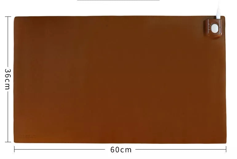 Two-stage Heating Desk Pad in black or pink, featuring quick warmth and waterproof design